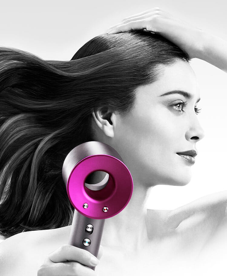 The Dyson Supersonic™ hair dryer in use
